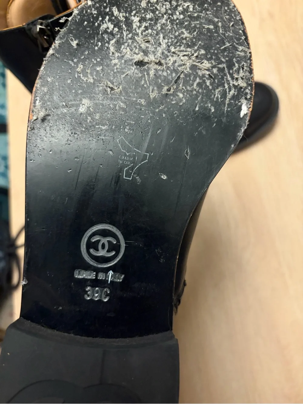 CHANEL Black Leather Lace-Up Combat Boots with Logo Cap